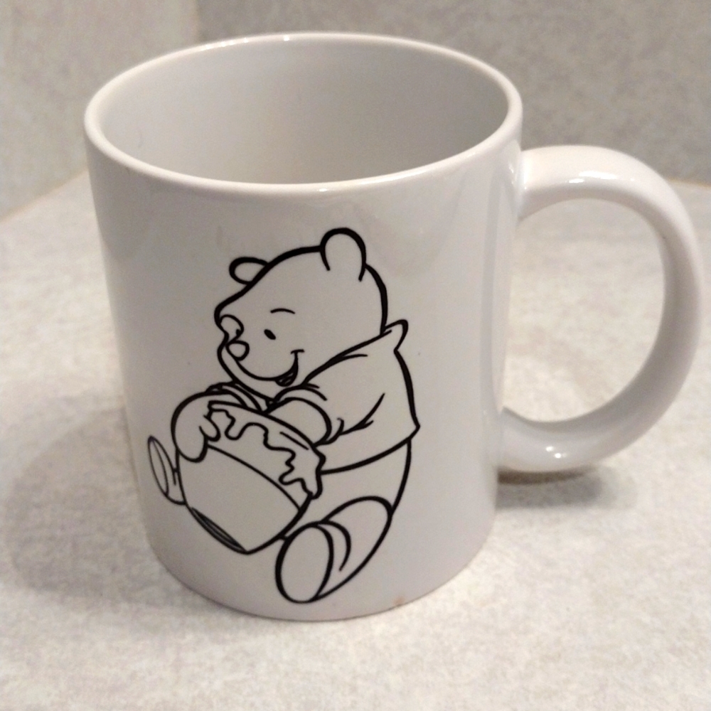 Cricut Winnie the Pooh coffee mug.